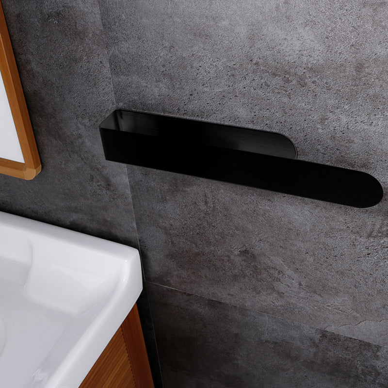 Adhesive stainless steel towel rack, gold, a chic bathroom organization accessory.
