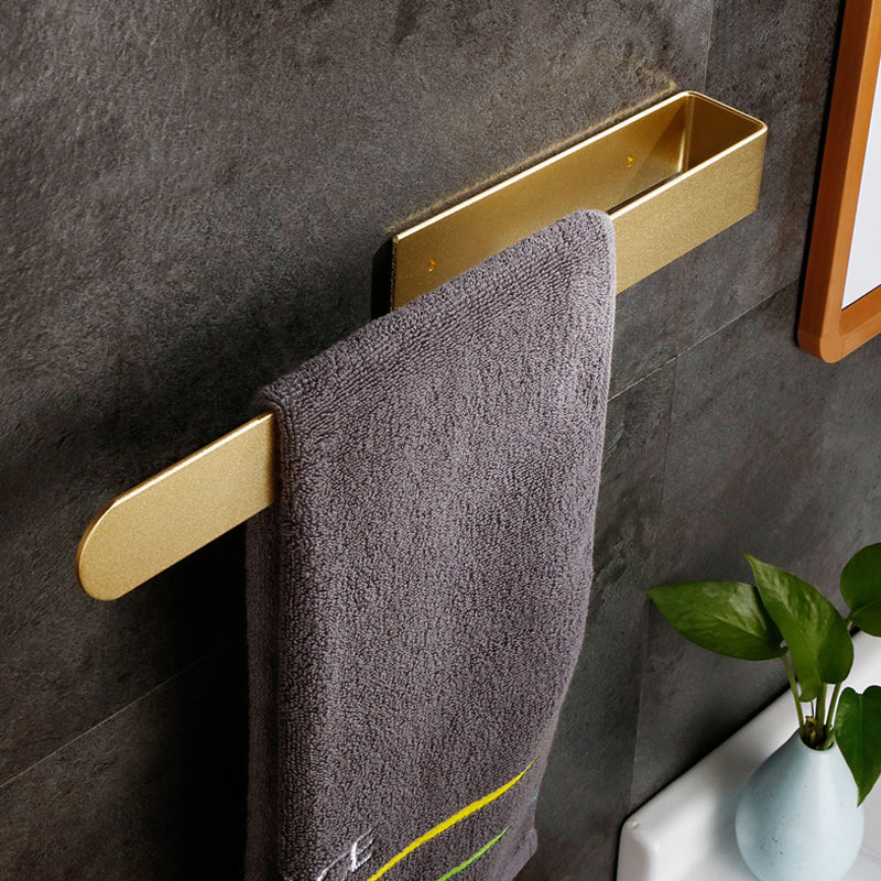 Gold adhesive towel rack, stainless steel, adds elegance to any bathroom space.