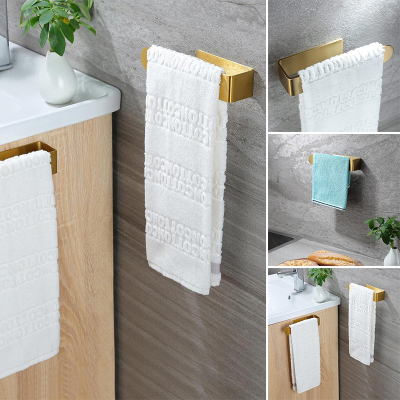 Adhesive towel bar made of stainless steel, gold finish for kitchen or bath.