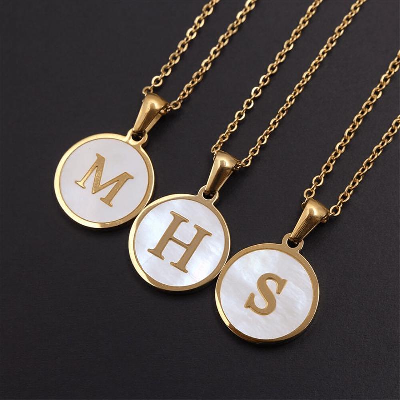 Personalized 'L' initial necklace, round shell design, gold material, delicate and stylish accessory for women