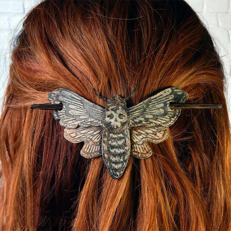 Gothic skull hair pin with intricate faux bone detail, metal finish, perfect for women's retro Halloween style.