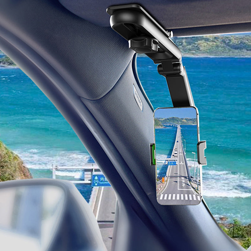 Gray sun visor phone mount, 360° rotating holder attached to a car visor, showing navigation.