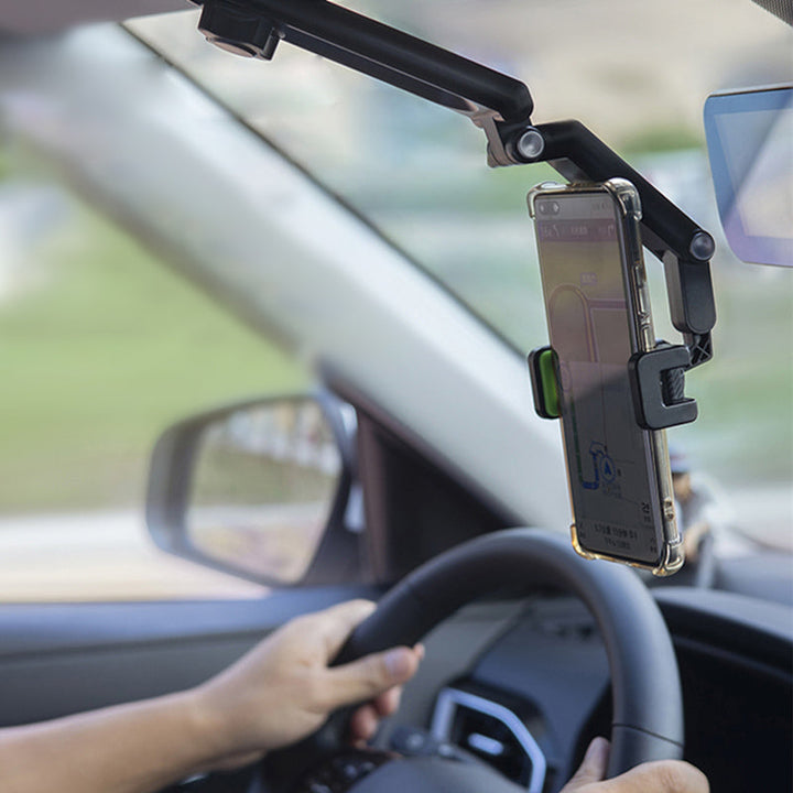 Detailed view of the universal car sun visor phone mount's clamping mechanism.