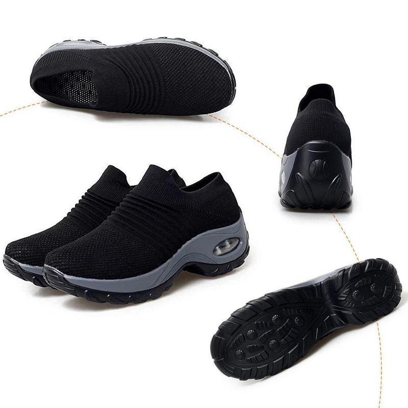 Purple women's athletic sneakers on a trail, showcasing their outdoor footwear capability.