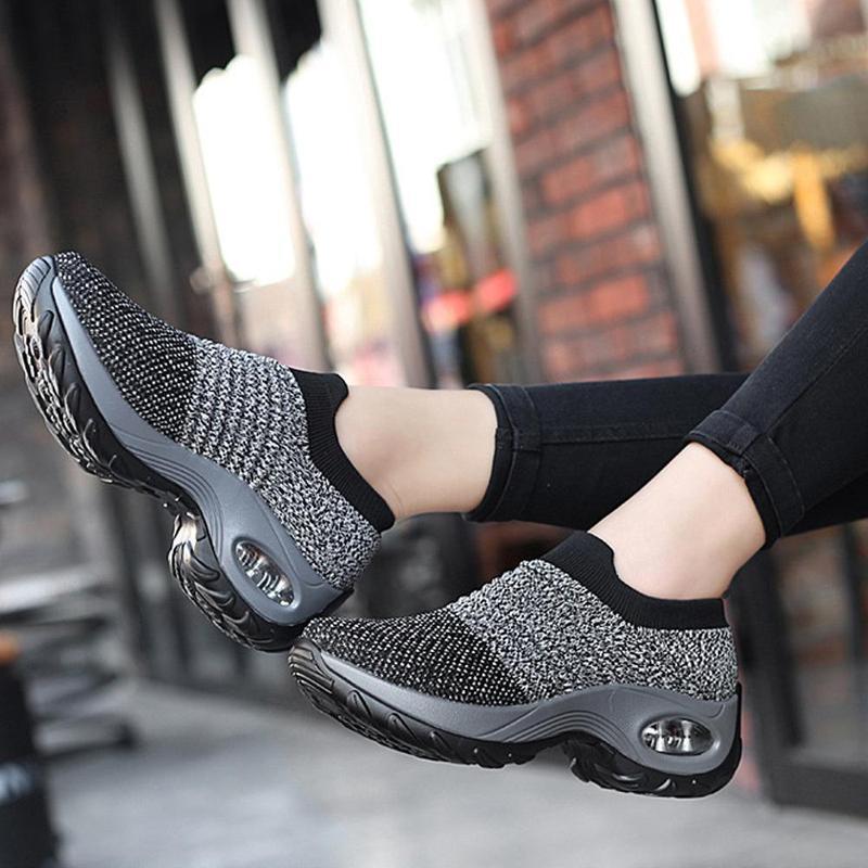 Red women's breathable outdoor sportswear shoes, styled for an active lifestyle.