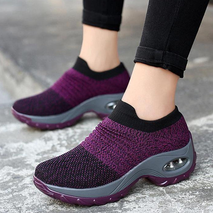 Comfortable purple women's air cushion walking shoes, ideal for athletic outdoor pursuits.