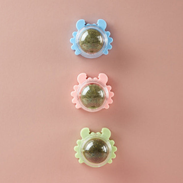 Set of three interactive pet catnip ball toys in green, blue, pink for cats