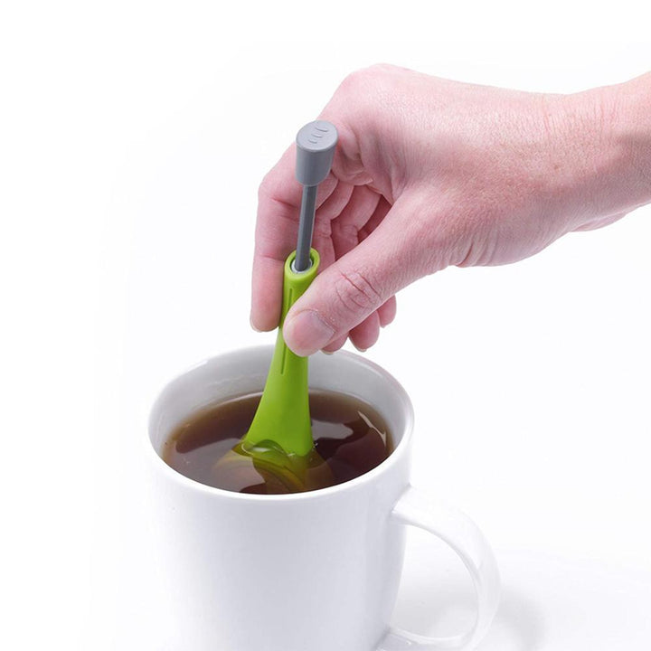 Loose leaf green tea infuser spoon, fine mesh; perfect tea accessory for easy brewing.