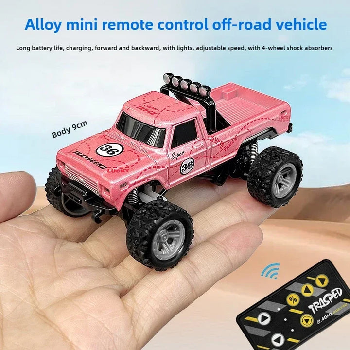 Green mini monster truck RC car for kids, an all-terrain remote control toy ready for any off-road challenge.