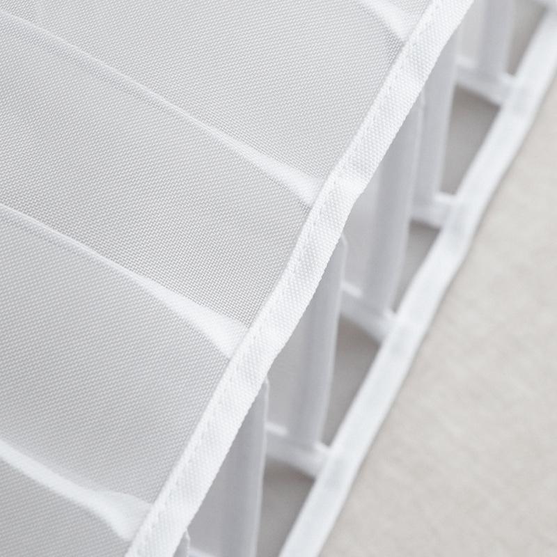 Packaging shot of the wardrobe organizer bins, showing product information clearly