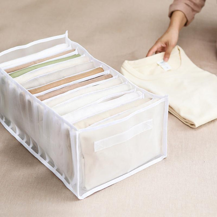 White mesh clothes organizer, 9-grid for leggings, in a messy drawer before use