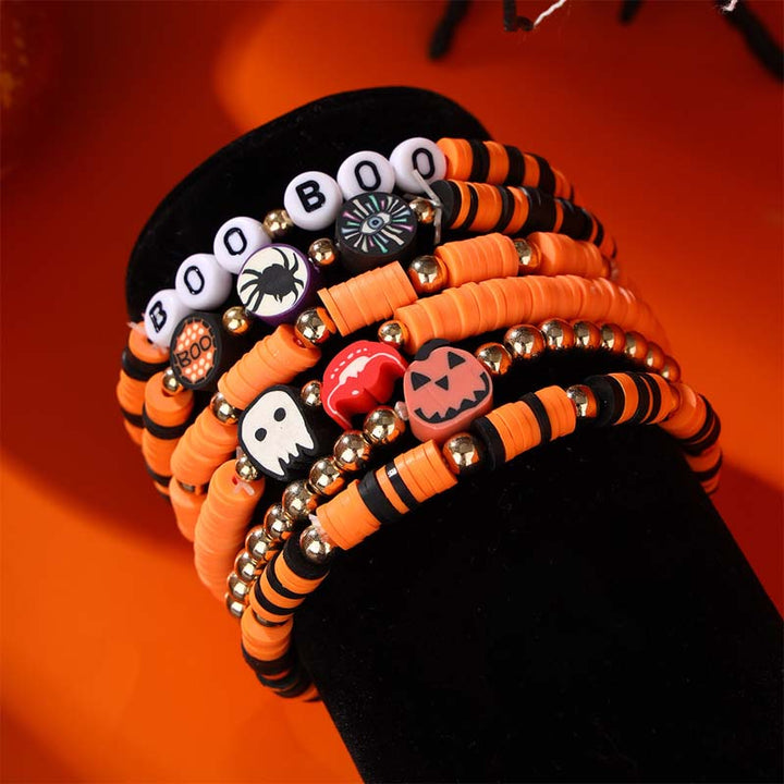 Halloween gift idea: a set of unisex bracelets with festive ghost and pumpkin beads.