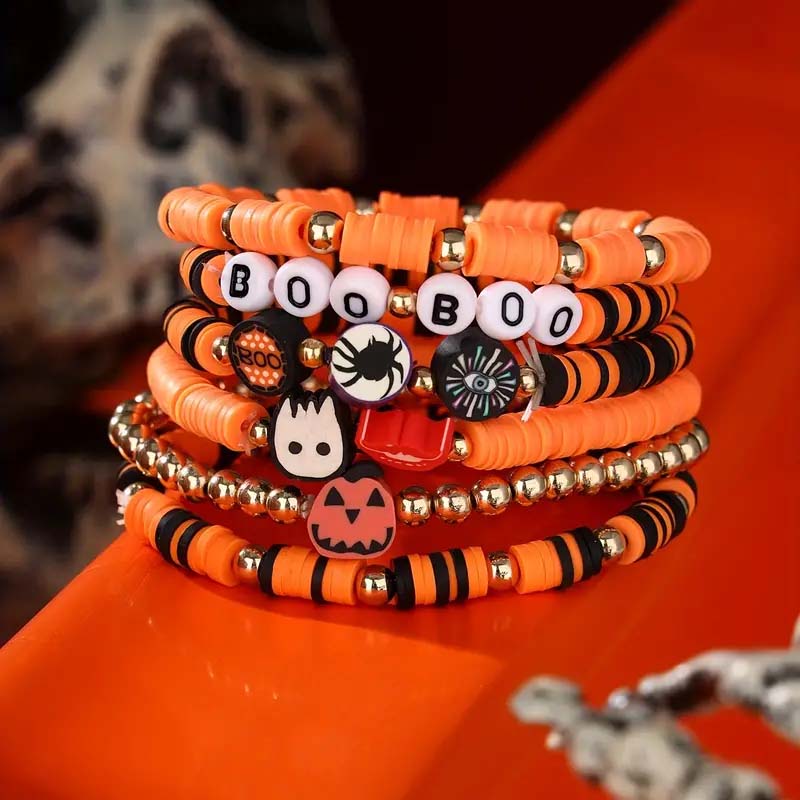 Detail shot of the spooky ghost charm on a Halloween beaded bracelet.