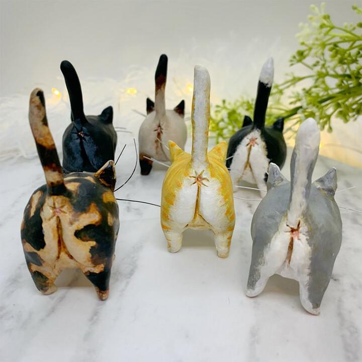 Hand-sculpted miniature kitty figurine, detailed and charming, perfect for cat lovers' decor.
