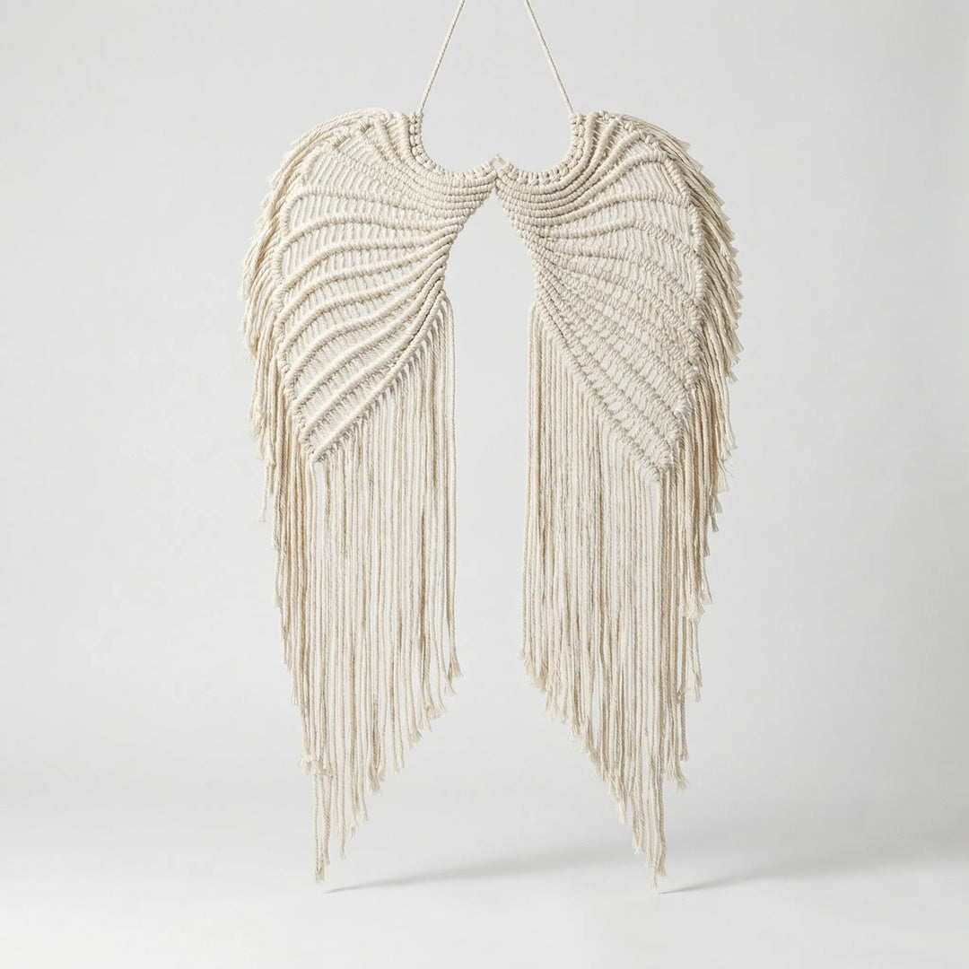 Bohemian macrame wall hanging art, handcrafted for a peaceful home decor accent with intricate wing design.