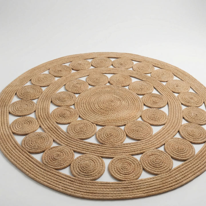 Close-up of a handcrafted round Flowique area rug showcasing its unique geometric wave pattern for modern homes.