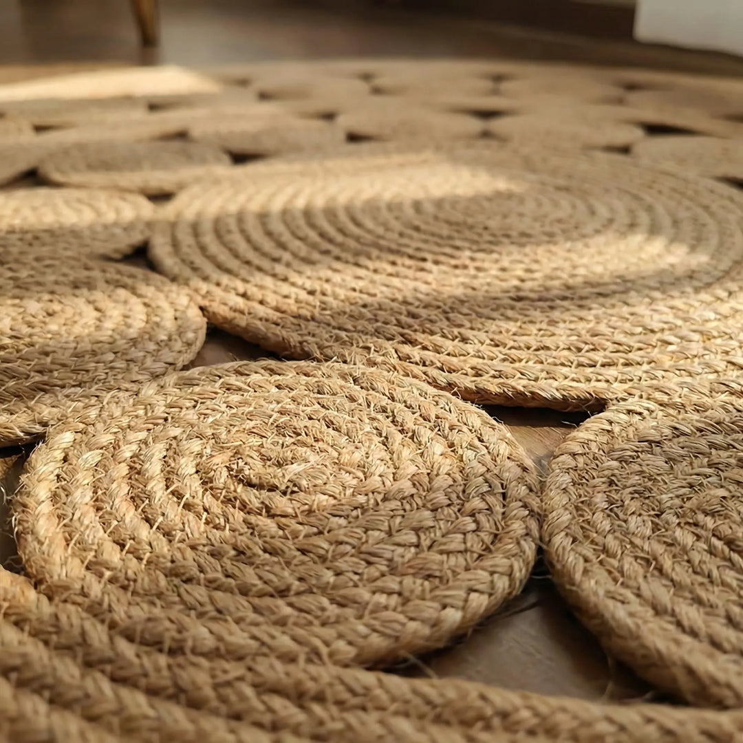 Stylish round Flowique accent rug with flowing waves, ideal for adding a chic, slip-resistant touch to any bedroom or living room.