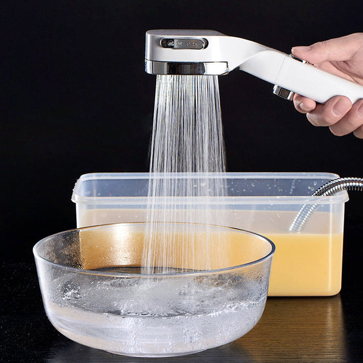 Handheld shower head with a durable chrome finish, offering a strong pressurized stream and water-saving pause.