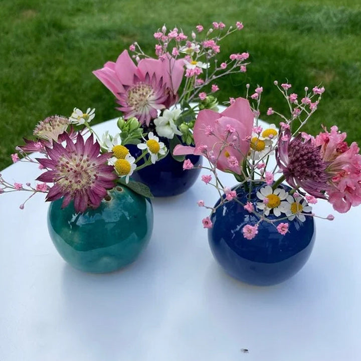 Close-up of a unique handmade resin mini vase, ideal as a small flower holder and home accent
