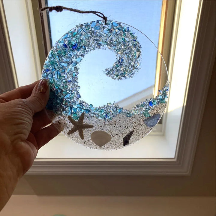Close-up of ocean wave sea glass suncatcher, acrylic coastal home gift, vibrant colors