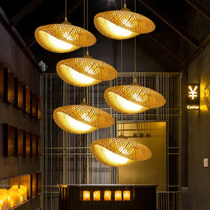 Woven rattan pendant lamp, natural boho ceiling light for a rustic or bohemian interior.