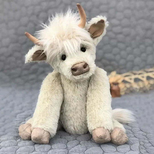 Handmade Scottish Highland Cattle plush toy with soft alpaca fur & moo sound, perfect children's or adult gift.