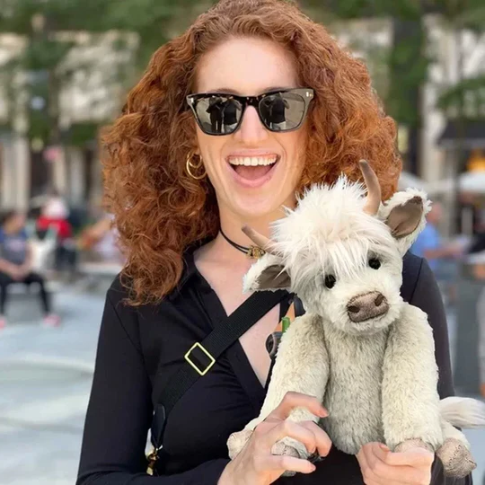 Collectible handmade alpaca fur Scottish Highland Cattle plush toy. Features a realistic moo sound, ideal unique gift.