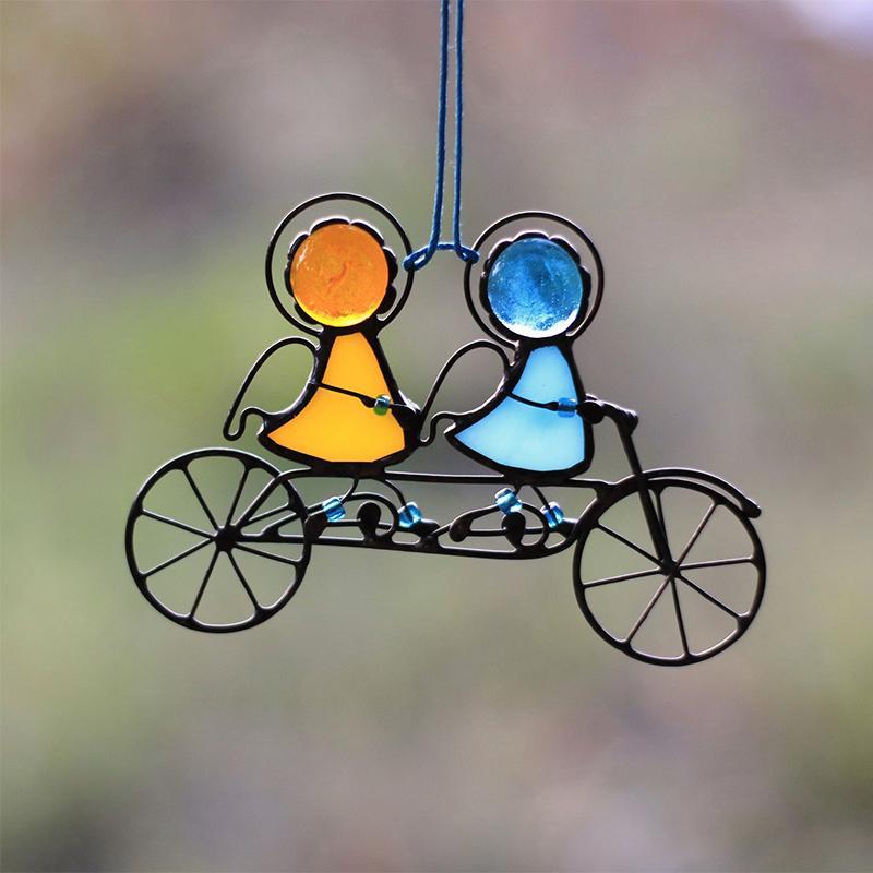 Artistic stained glass angel suncatcher, iridescent and clear glass, beautiful for window hanging home decor.