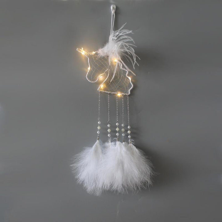 Children's dream catcher with a whimsical unicorn design, perfect as a gift or wall hanging.