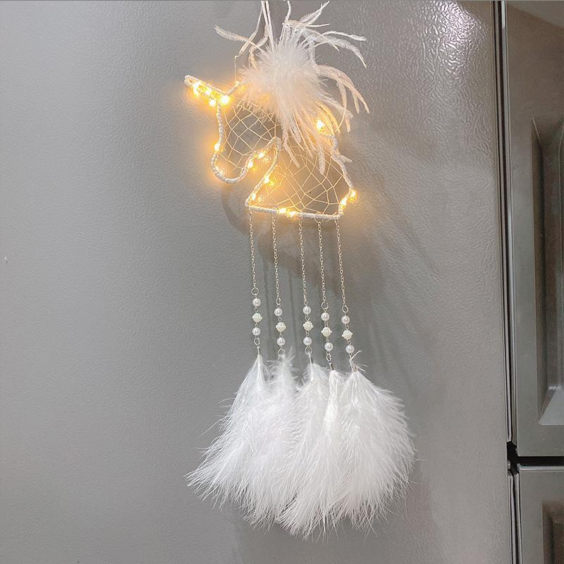 Unicorn dream catcher, a charming and unique piece of handmade children's room decor.