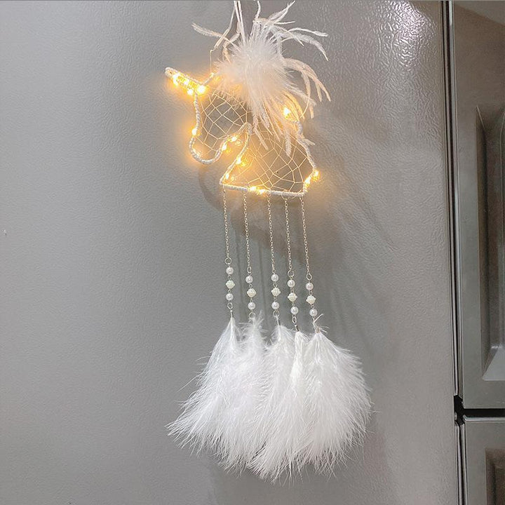 Unicorn dream catcher, a charming and unique piece of handmade children's room decor.