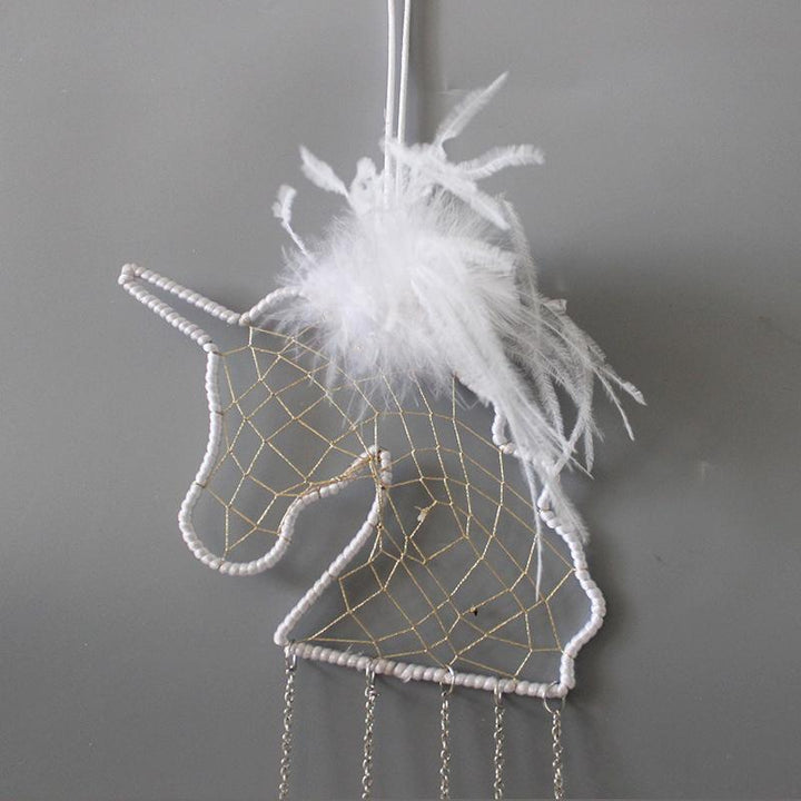 Dreamy unicorn dream catcher, handcrafted for a magical and serene kids' bedroom environment.