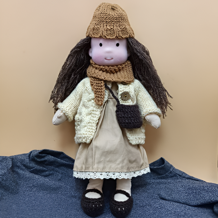 Eco-friendly soft Waldorf doll, a natural handmade toy for young children.