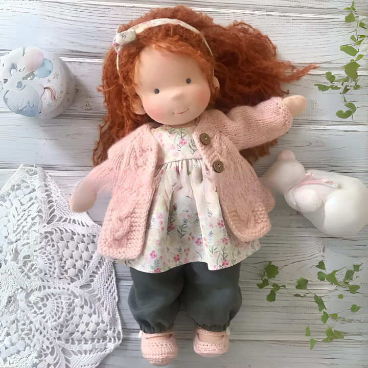 Kids' handmade Waldorf doll, a gentle and soft natural toy.