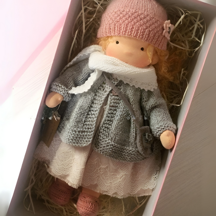 Handmade Waldorf cuddly doll, an eco-friendly gift for kids.