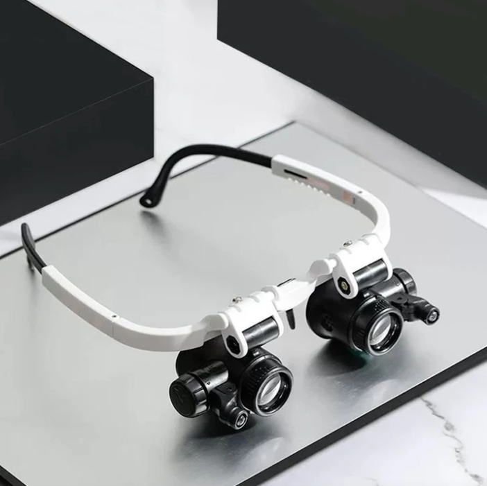 LED headband magnifier for precision work. Ideal for jewelry making, model building, and electronic repair with 8x-23x zoom.