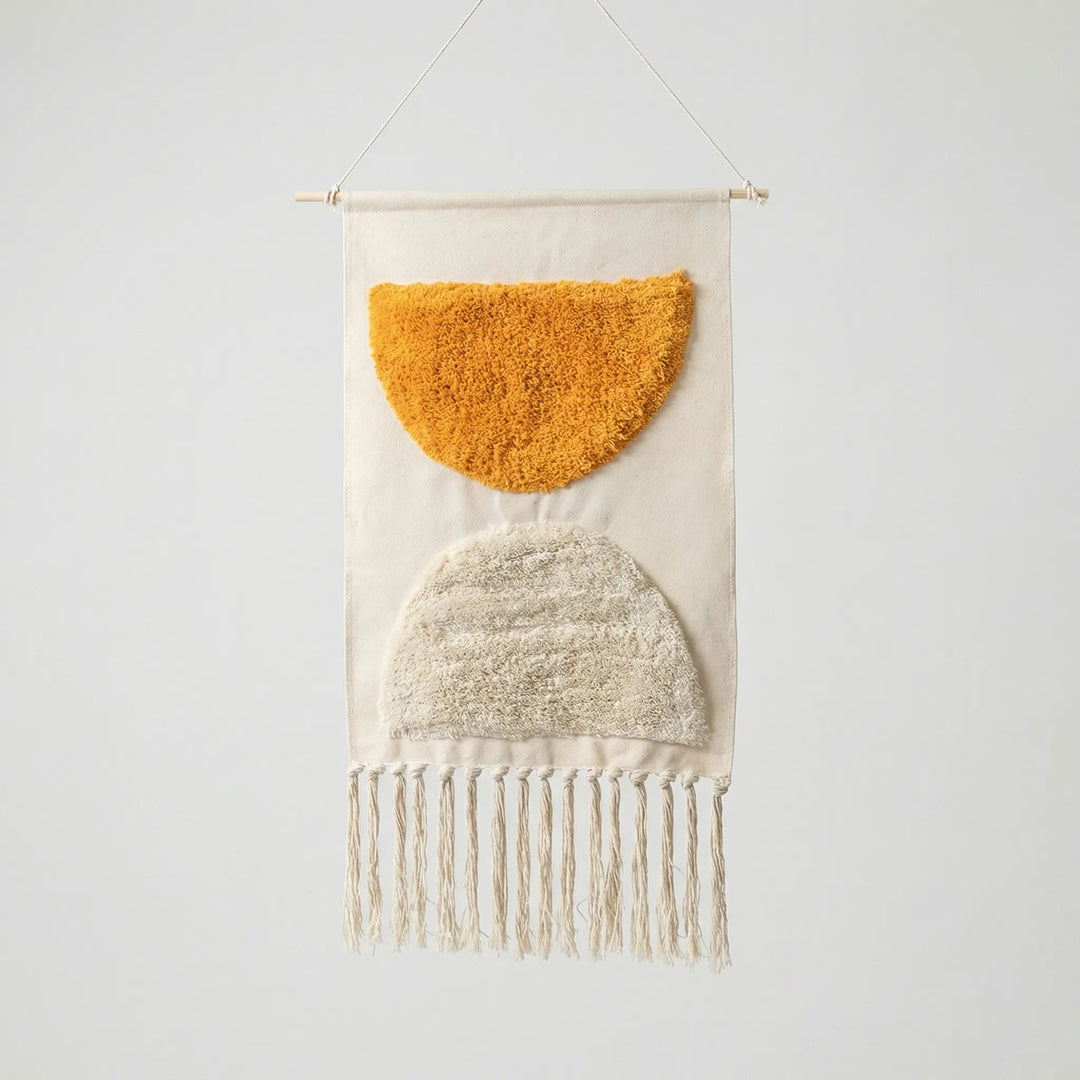 Bohemian handwoven geometric textile wall art tapestry with modern wave design & decorative fringe.