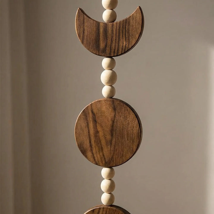 Neutral handwoven moon motif wall hanging. Bohemian woven art perfect for living room, bedroom, or entryway decor.