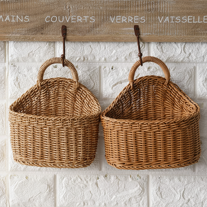 Natural handwoven wall baskets with handles, ideal for stylish kitchen, bathroom, or living room decor.