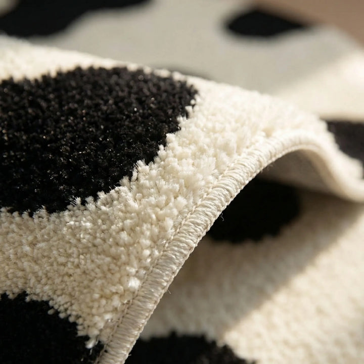 Cozy heart-shaped bedroom rug featuring Flowique wave design. Slip-resistant and easy care modern home decor.