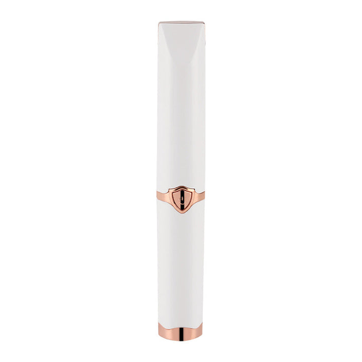 Detail of the heated eyelash curler's gentle heating element, designed for safe and efficient lash styling