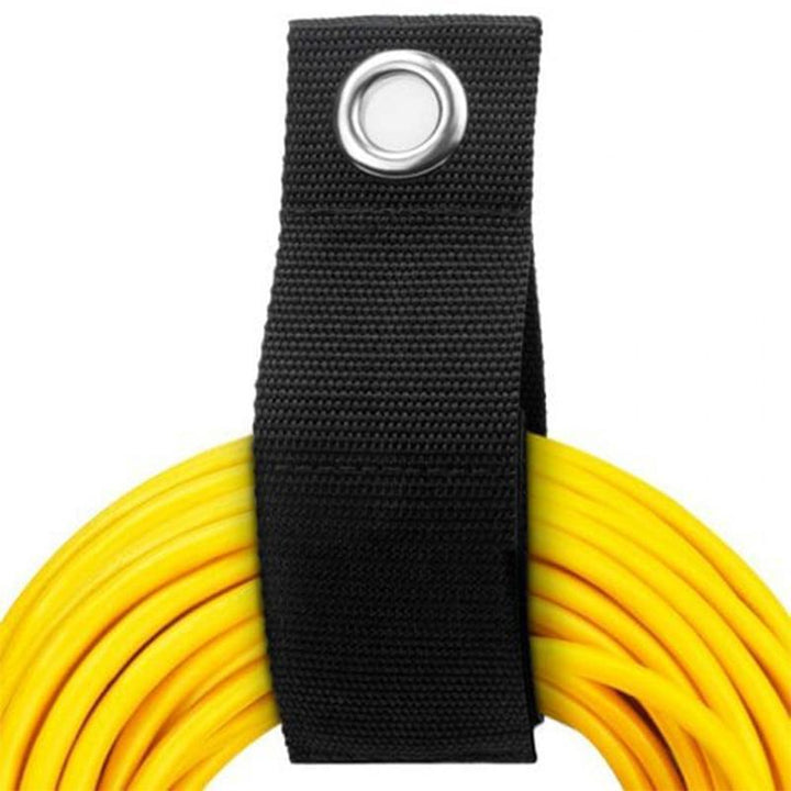 Black nylon velcro organizer straps, stacked neatly, ready for home improvement and tool organization.