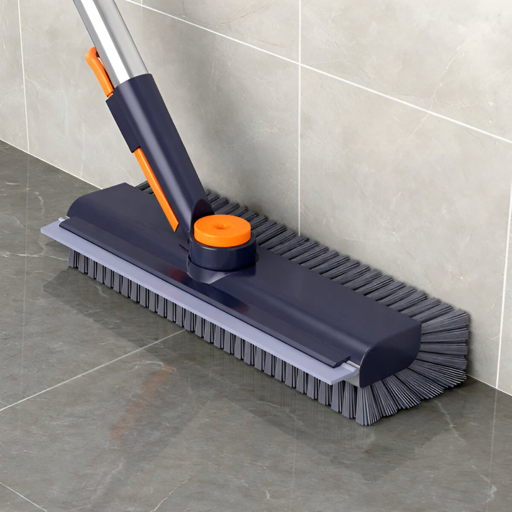 Manual heavy-duty cleaning brush with long handle for effective home floor scrubbing, tiles & grout.