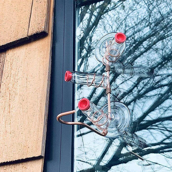 Red-accented window hummingbird feeder, attracting hummingbirds for close-up bird watching