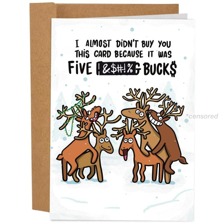 Group of humorous holiday cards, gift cards, and envelopes, ready for sending witty seasonal humor.