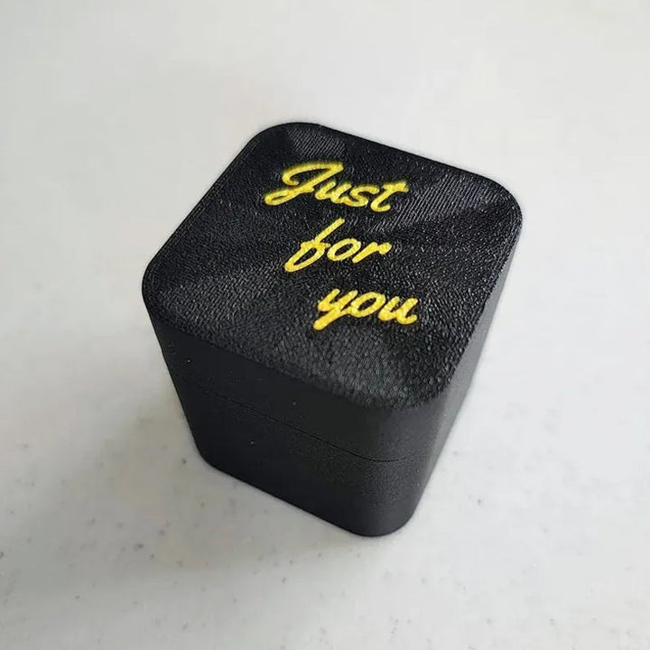 Surprise novelty prank gag gift box, perfect for office humor, black & gold