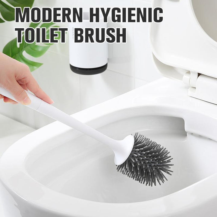 Hygienic silicone toilet brush with quick-dry holder, wall-mounted for modern bathrooms.