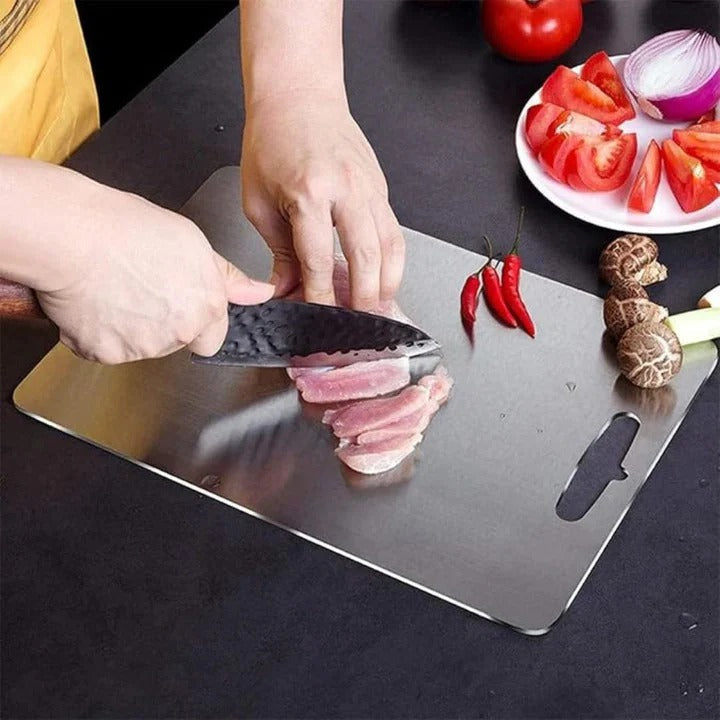 Durable titanium kitchen cutting board, space-saving design. Essential modern food prep tool.