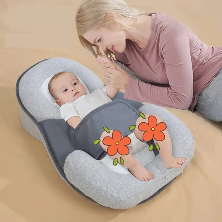 Infant anti-spit-up inclined pillow, white, supporting comfortable digestion and reflux relief for newborns.