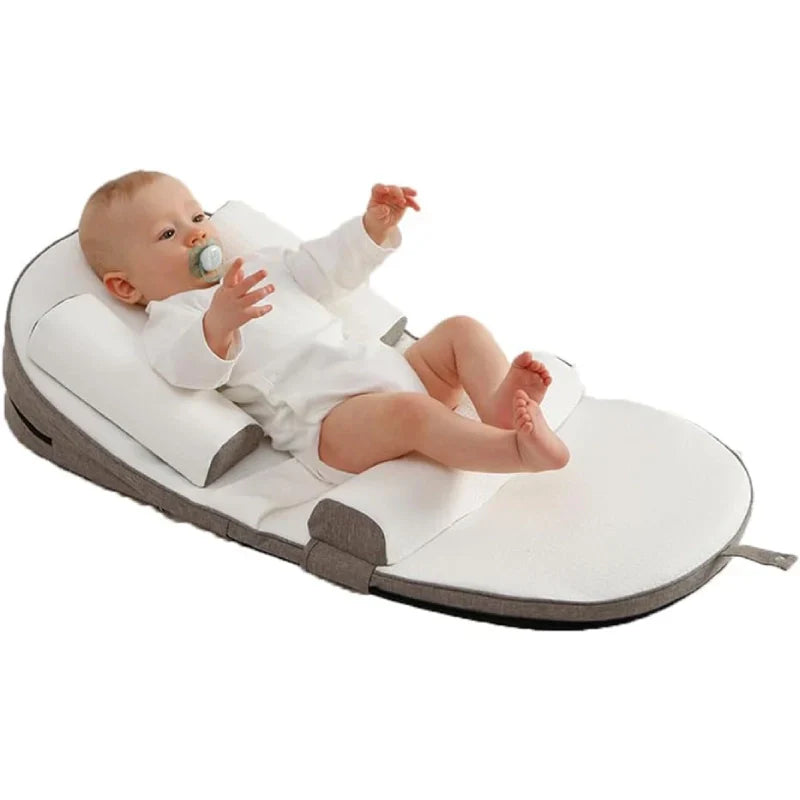Thoughtful baby gift: side sleeper pillow for newborns, promoting peaceful sleep & crucial head support.